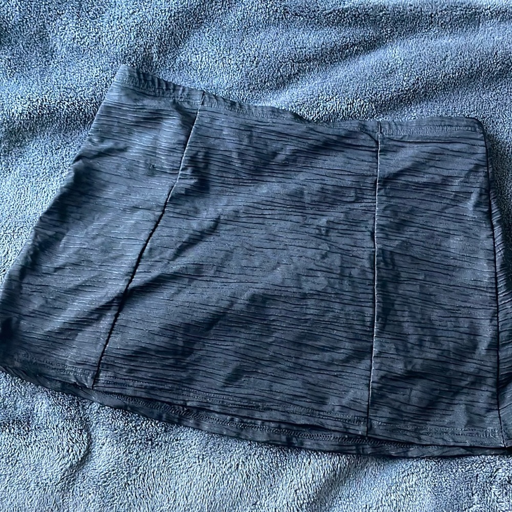 Black textured swim skirt